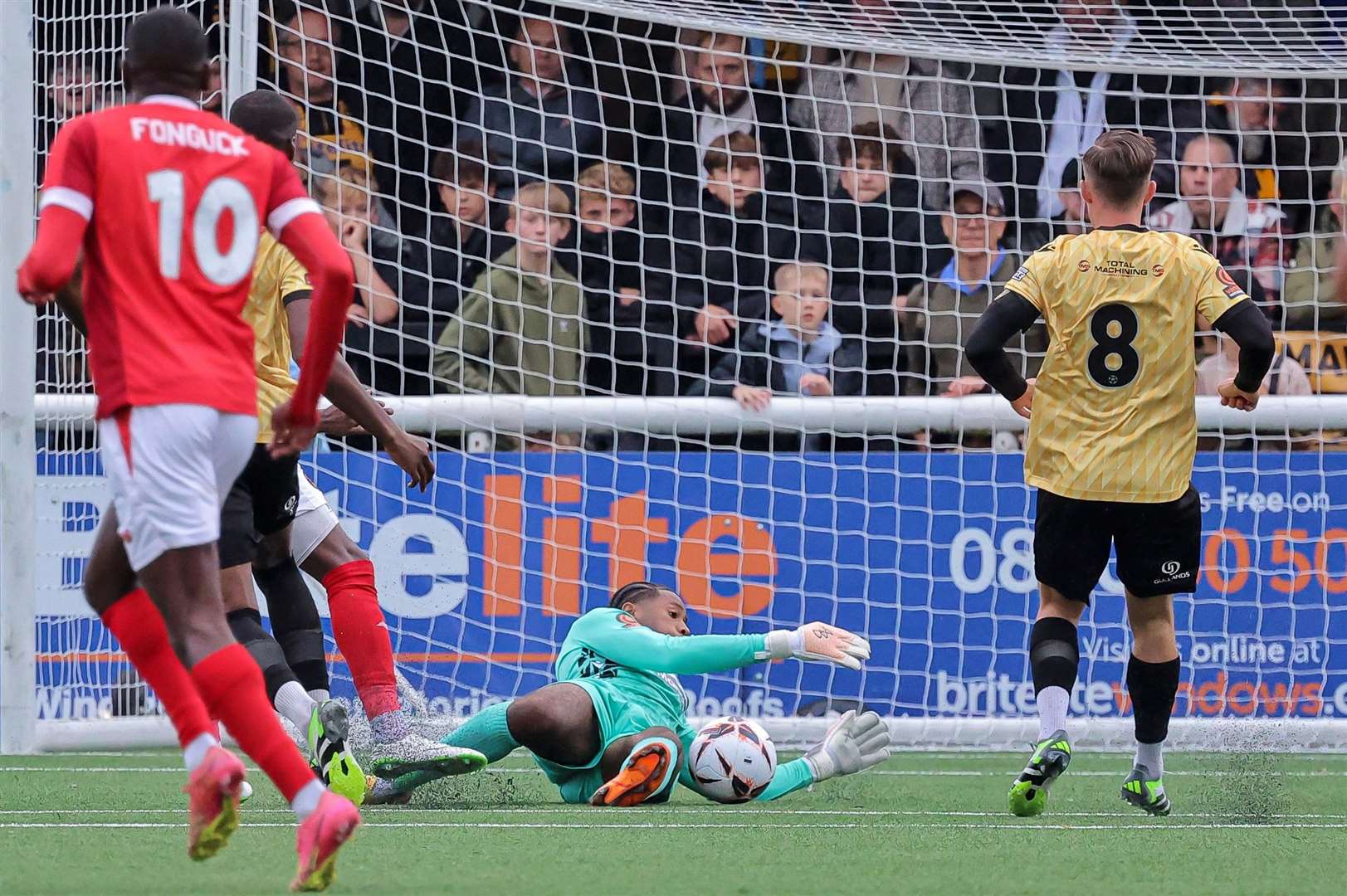 A rare Ebbsfleet attack as Maidstone keeper Alexis Andre Jr denies Rakish Bingham while substitute Wesley Fonguk looks on. Picture: Helen Cooper