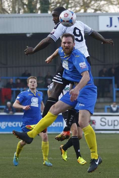 Dover's Nathan Elder wins the ball in the air against Basingsoke Picture: Matt Bristow