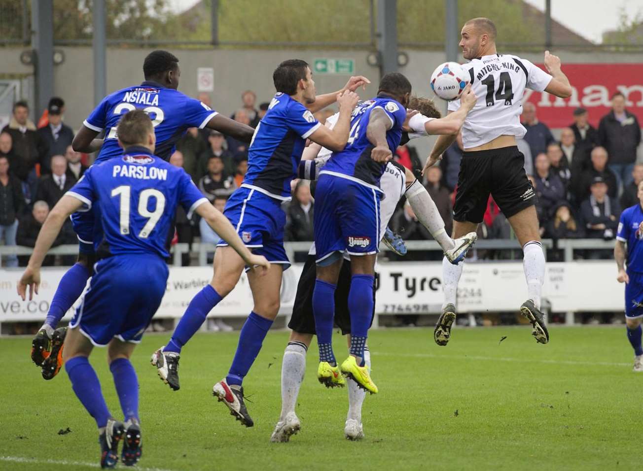 Mat Mitchel-King rises well to attack a set-piece Picture: Andy Payton