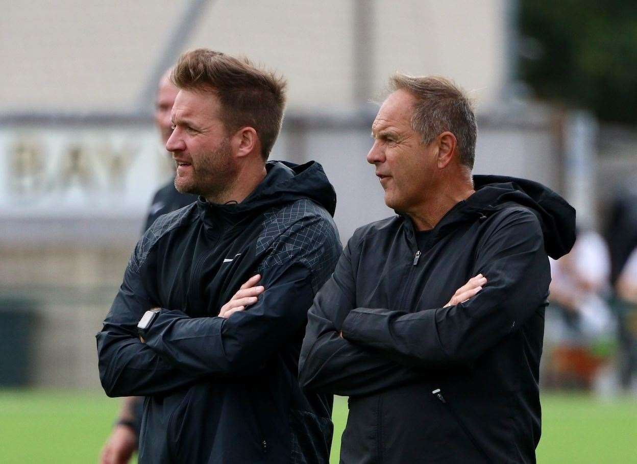 Herne Bay boss Steve Lovell and his assistant, and son, Mark Lovell watch on. Picture: James Aylward