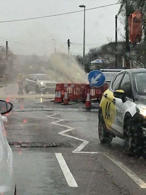 Water is spraying across the road in Princes Avenue, Walderslade. Pic: Kelly Louise Kirby