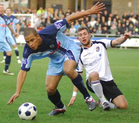 Dartford's Ryan Hayes tries to win the ball off Tom Wynter