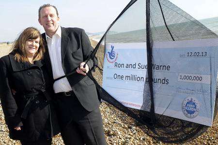 Hythe angler Ron Warne and wife Sue celebrating a £1million EuroMillions win