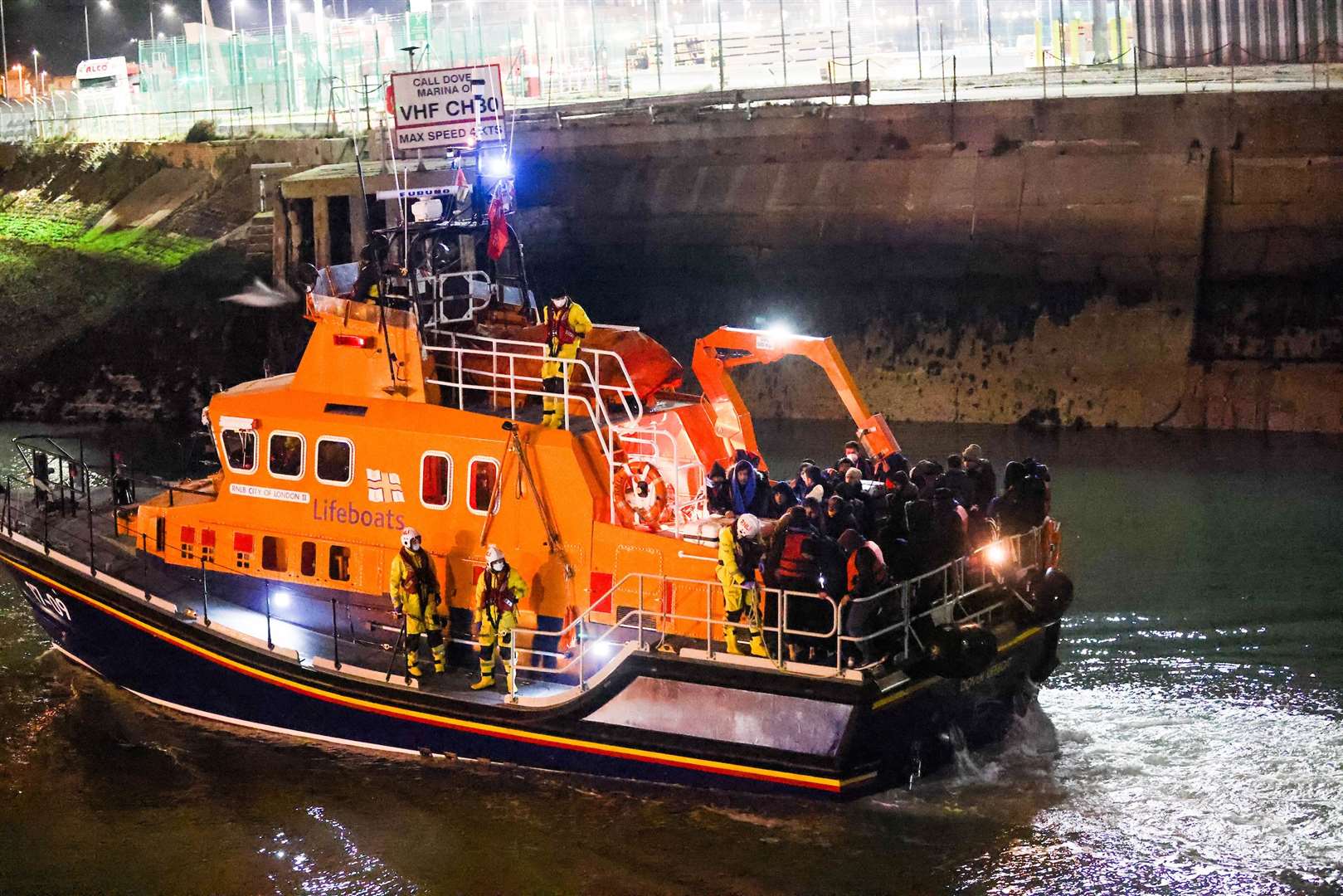 A lifeboat brings in the asylum seekers. Picture: UKNIP