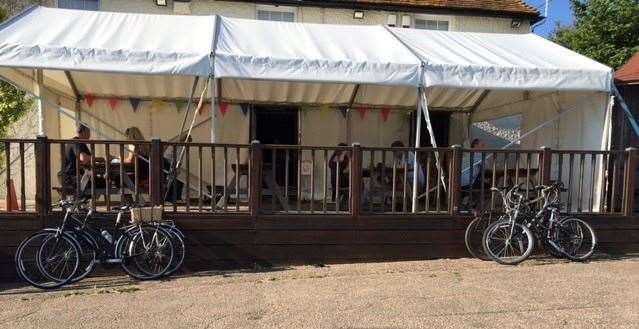 The covered decking area at the front of the pub has plenty of seating and is popular with visitors on warmer days