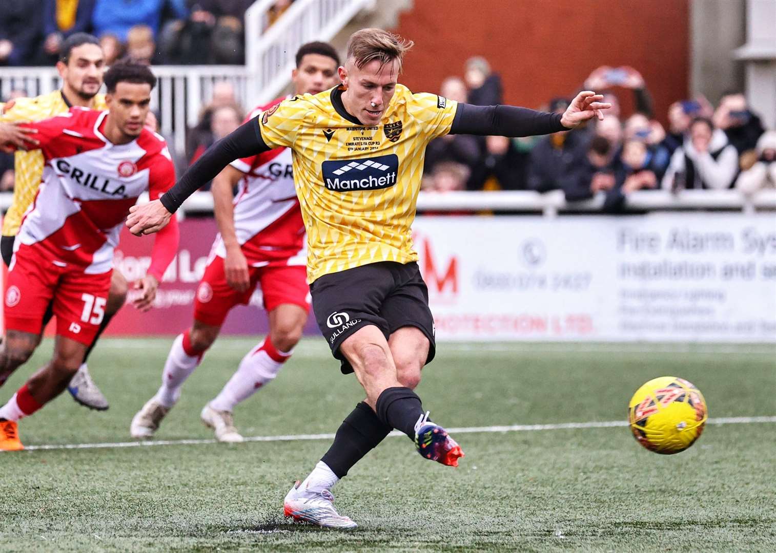 Sam Corne scores Maidstone’s winner against Stevenage from the penalty spot. Picture: Helen Cooper