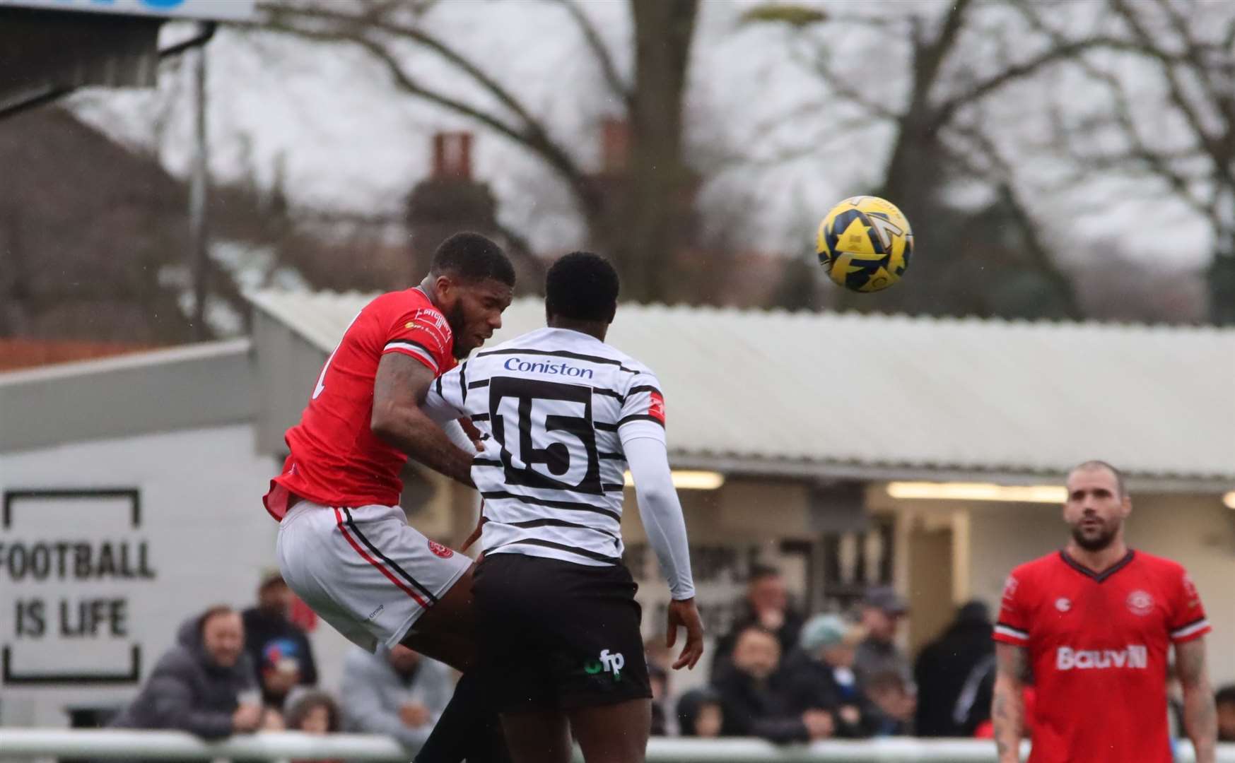 Returning Margate midfielder Mo Kamara battles in the air during their 2-1 Isthmian Premier derby defeat at Chatham on Saturday. Picture: Max English (@max_ePhotos)