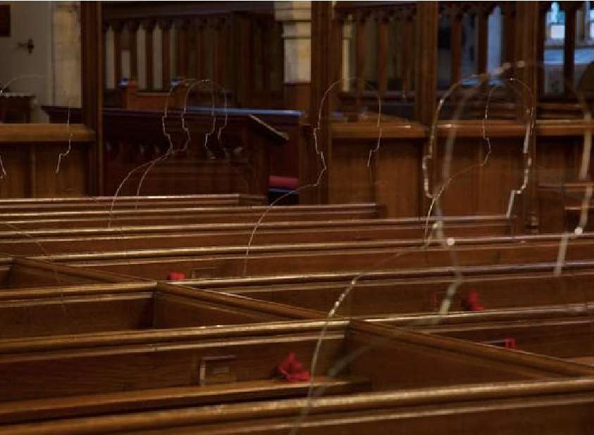 Silhouettes sat in the pews of Penshurst Church