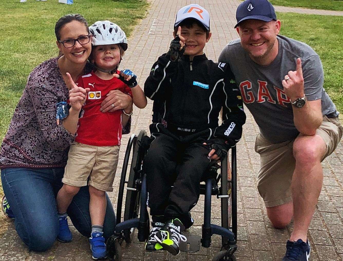 Matt Knoesen (centre) with his mum Kerry, brother Tim and father Gavin