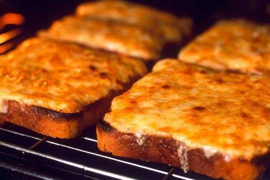 The teen was making cheese on toast for his mum