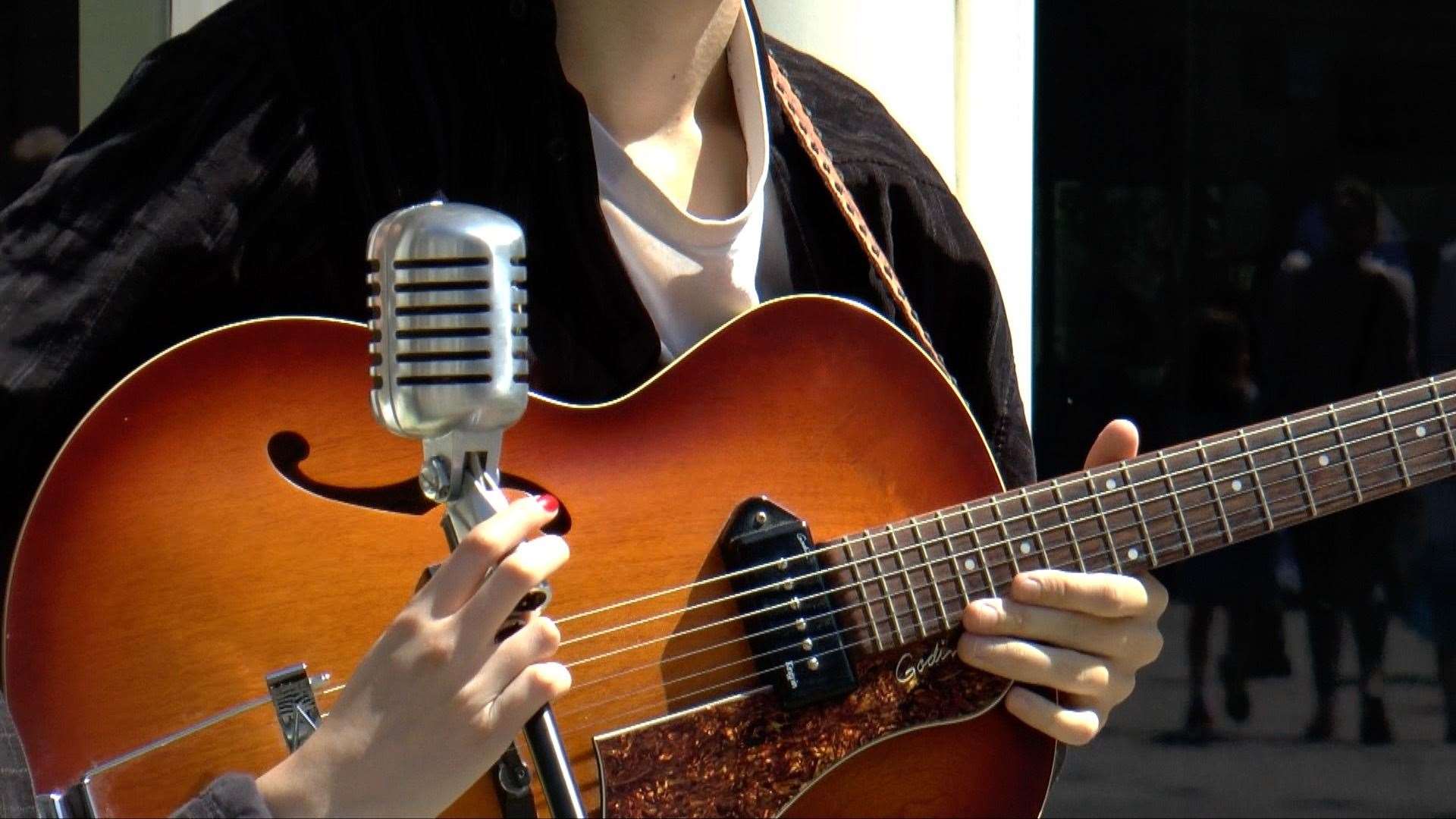 Buskers return to busy town centres for the first time in months