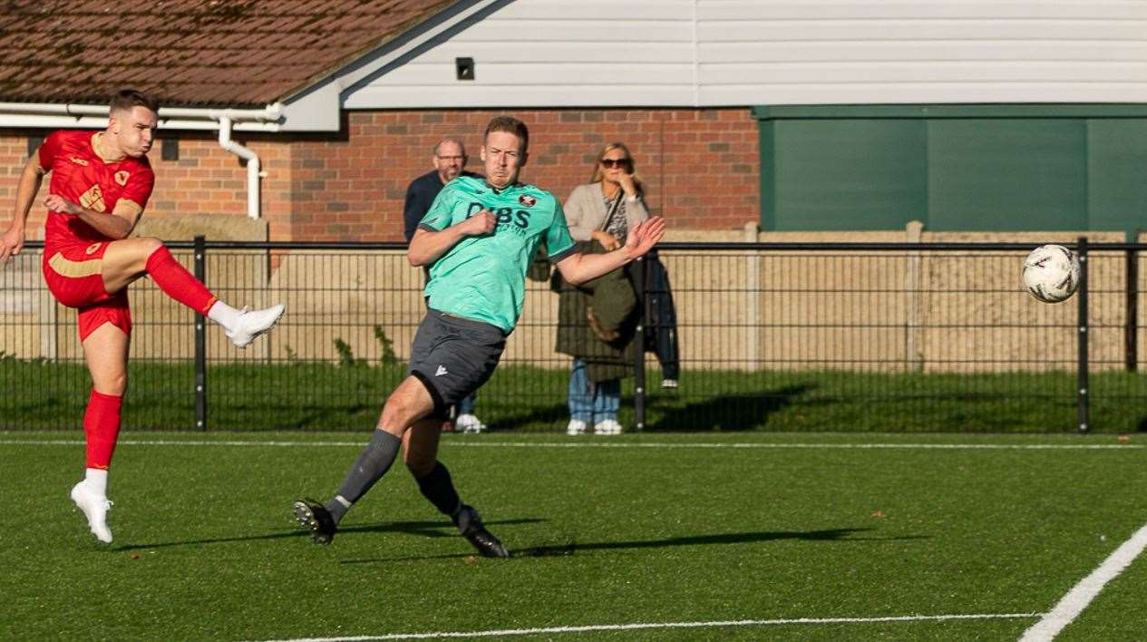 Josh Oliver scores what proved to be the winner for Whitstable Town in the FA Vase against Virginia Water on Saturday. Picture: Les Biggs