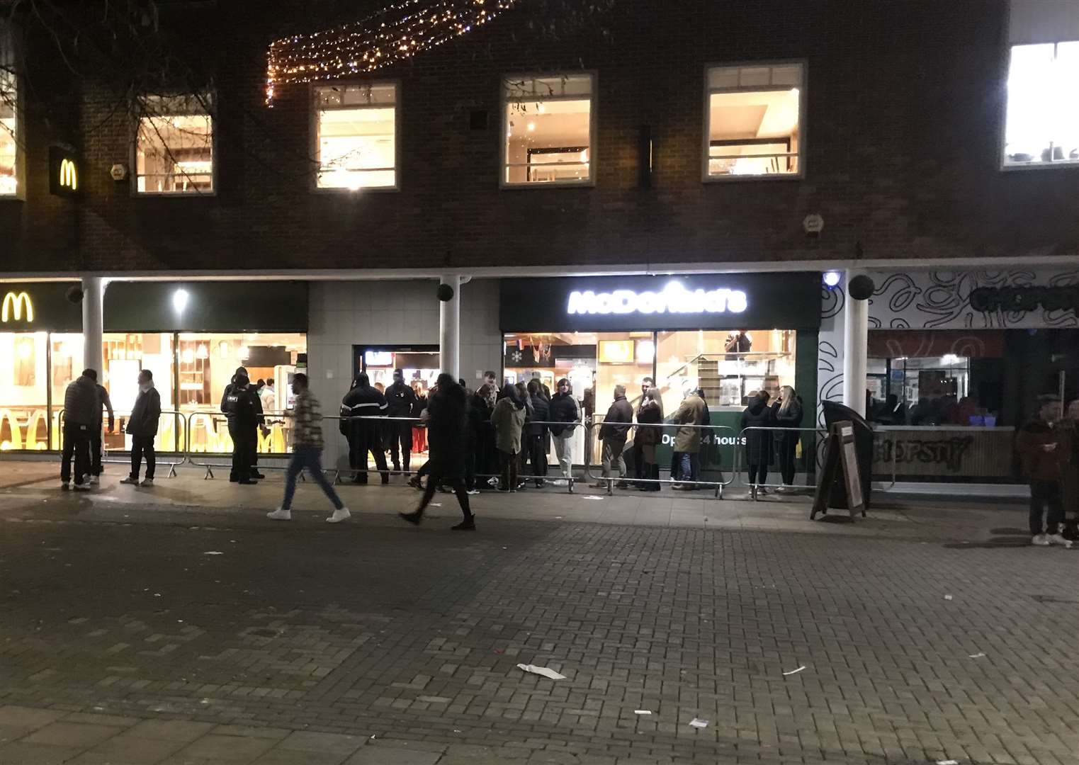 The queue for McDonald's snakes into the street outside