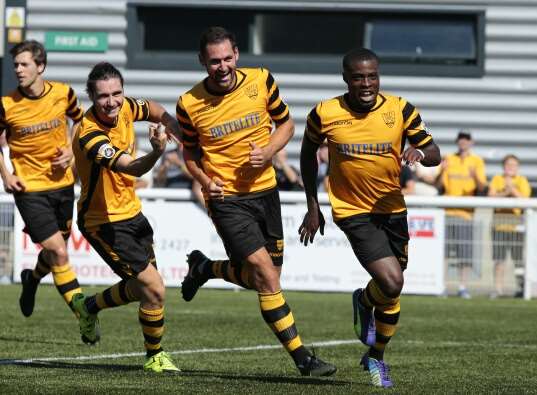 Alex Akrofi celebrates doubling Maidstone's lead Picture: Martin Apps