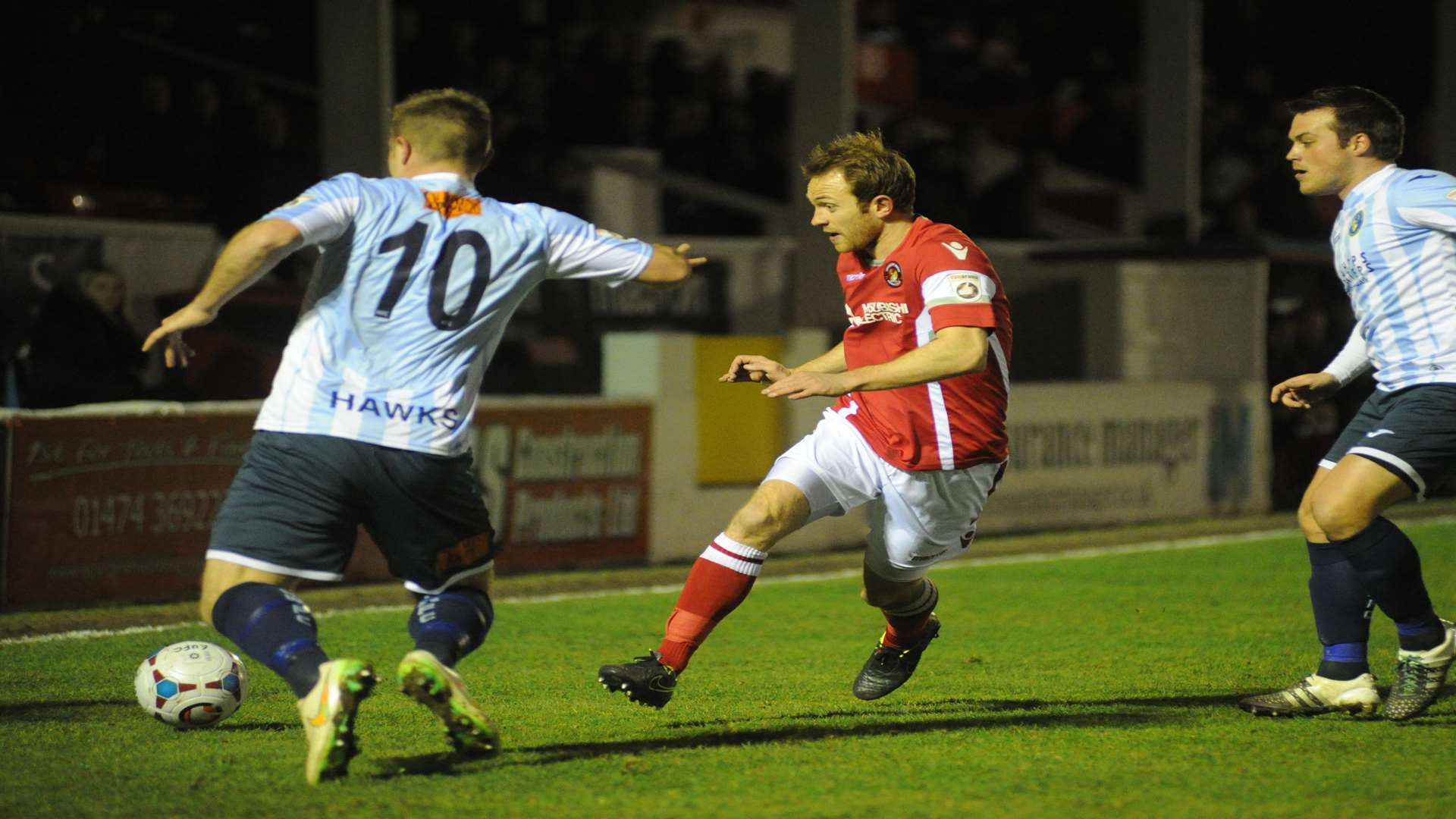 Stuart Lewis looks to nick the ball beyond Nic Ciardini Picture: Steve Crispe