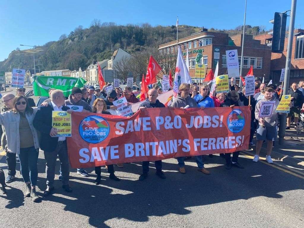 There are chants of 'seize the ships' as protesters march towards the port