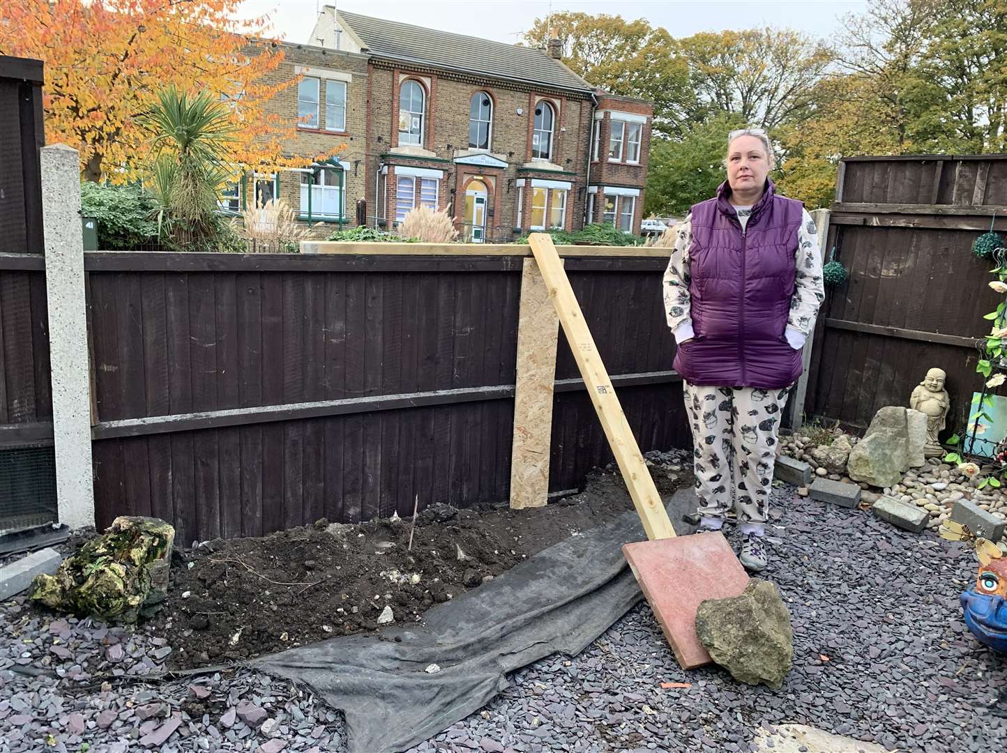 Laura Crisp with the makeshift fence after the crash