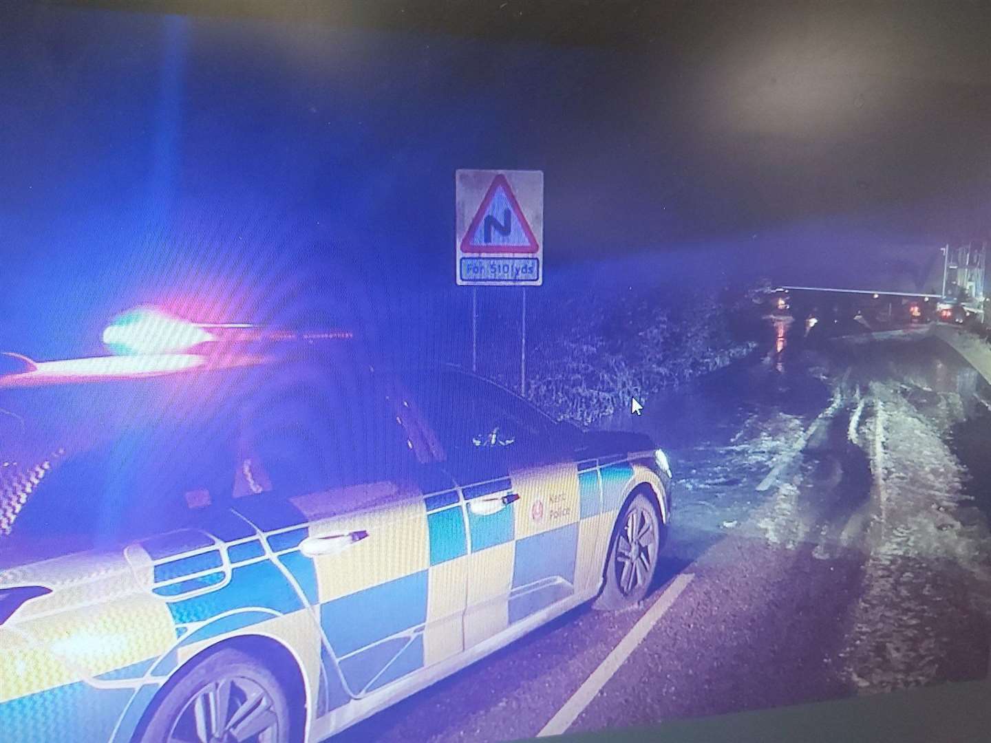 Police at the scene of a jackknifed lorry in Swanscombe yesterday.