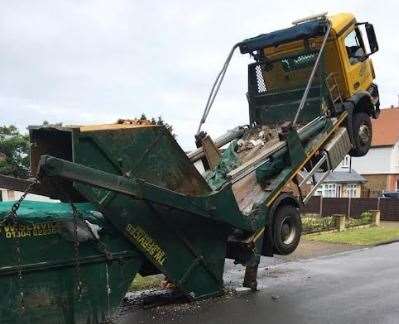 The skip lorry tipped into a vertical position in Kingsgate Avenue in Broadstairs