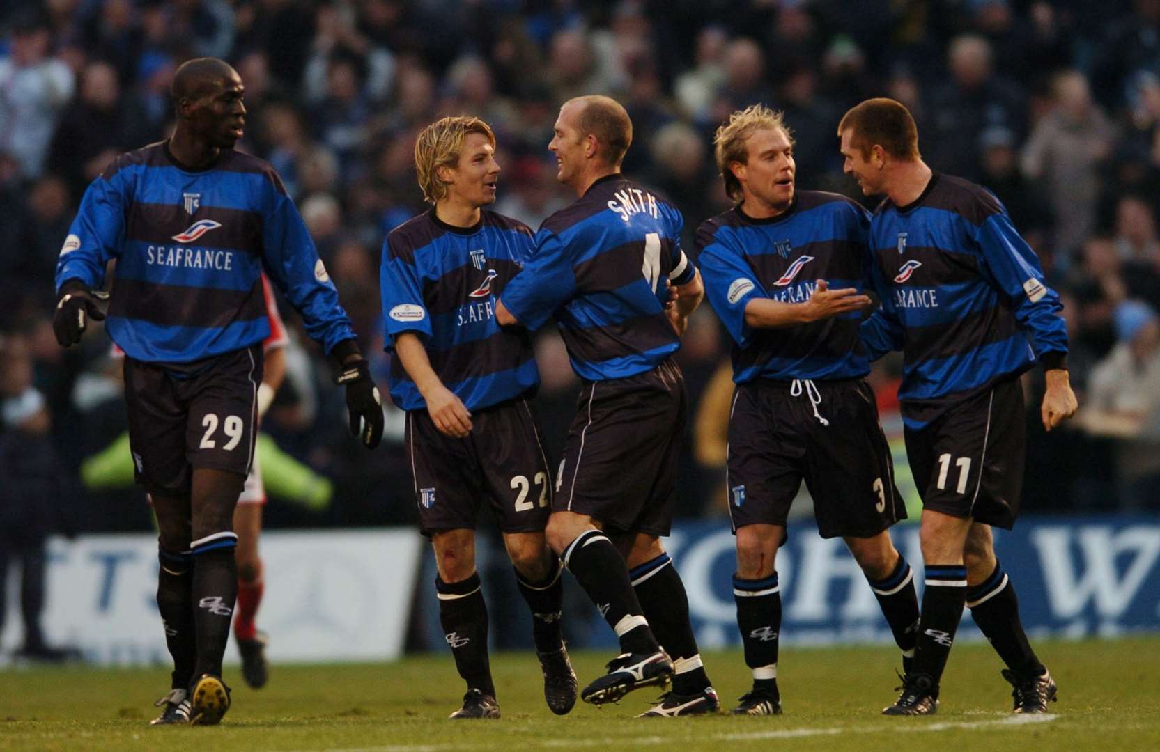 Gillingham players celebrate Paul Smith's goal