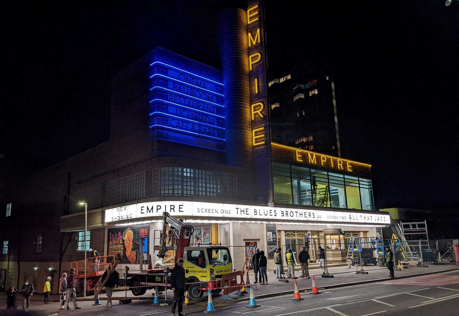 The building lights up under the guise of the Empire cinema, for filming of the Empire of Light movie Pic: Roy Foord