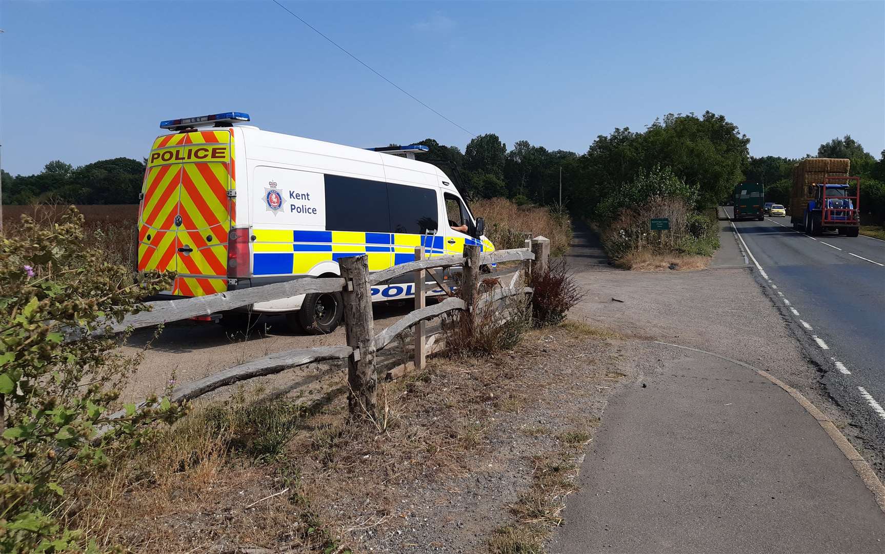 A police van parked on the A20 near Mersham, close to where Mrs Ratcliffe's body was found