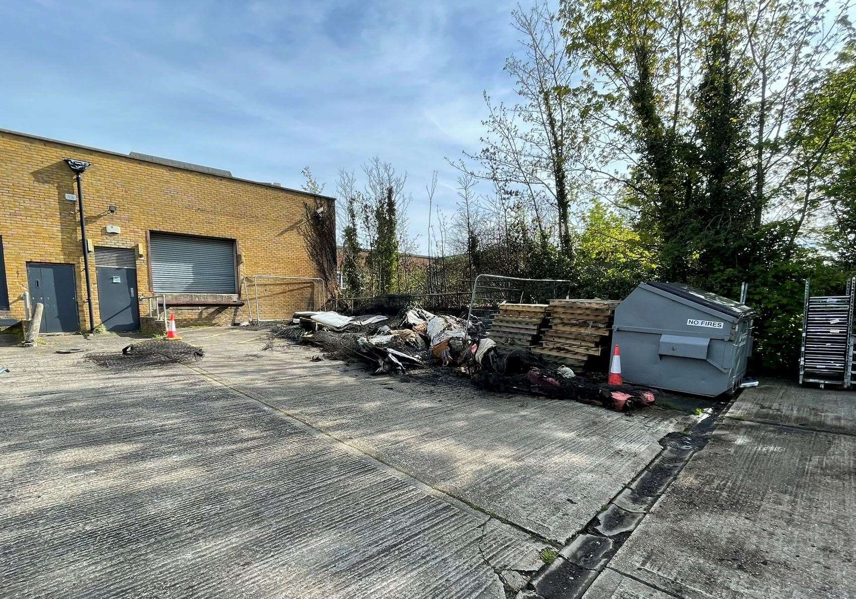 The backyard of Kent Beds and Sofas in Sittingbourne High Street after the fire