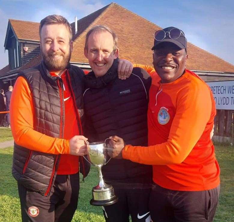 Mickey Doyle, centre, has stood down as Lydd manager.