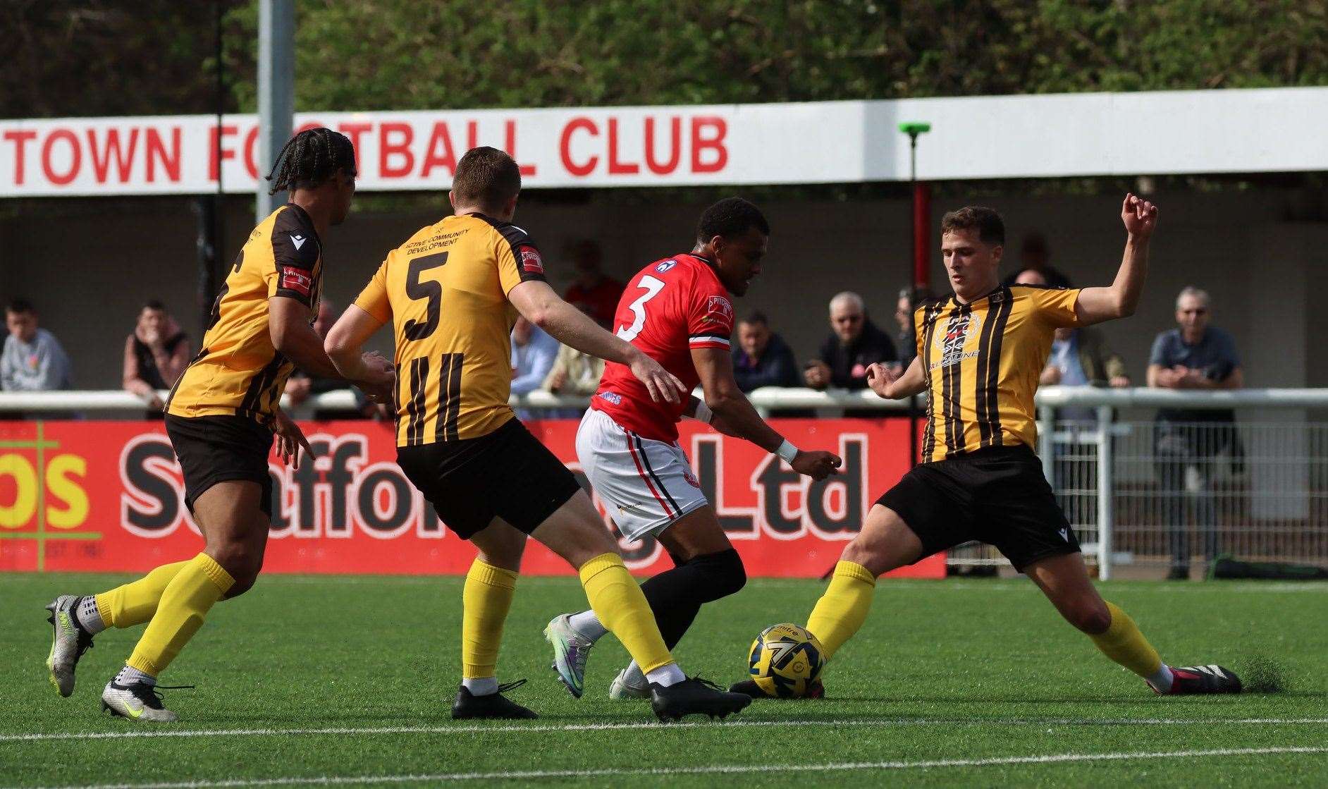 Jamie Mascoll is crowded out on the edge of the penalty box during Chatham Town’s weekend win Picture: Max English (@max_ePhotos)