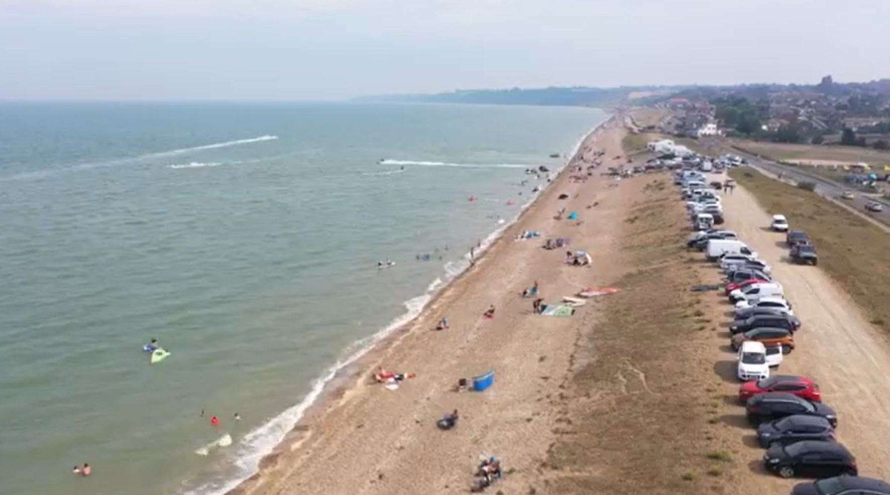 The Shingle Bank at Minster on the Isle of Sheppey showing cars parked along the top. Motorhomes are now restricted to a small area near the White House. Drone picture: Ricky Wooding