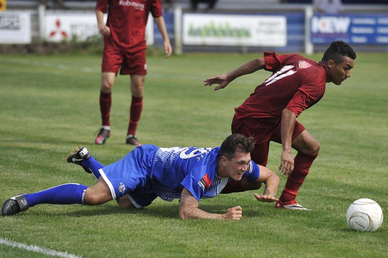 Canterbury push forward against Herne Bay (blue). Picture: Tony Flashman FM3318330