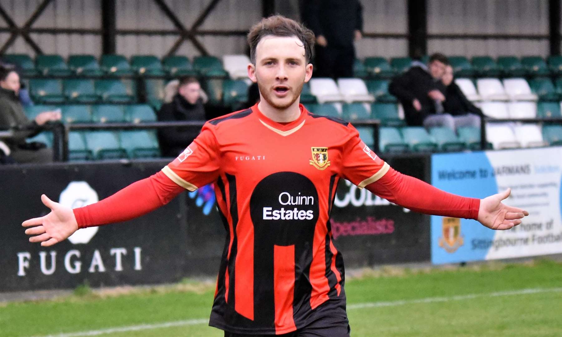 Taylor Fisher celebrates his winner for Sittingbourne against Hythe. Picture: Ken Medwyn (54435322)