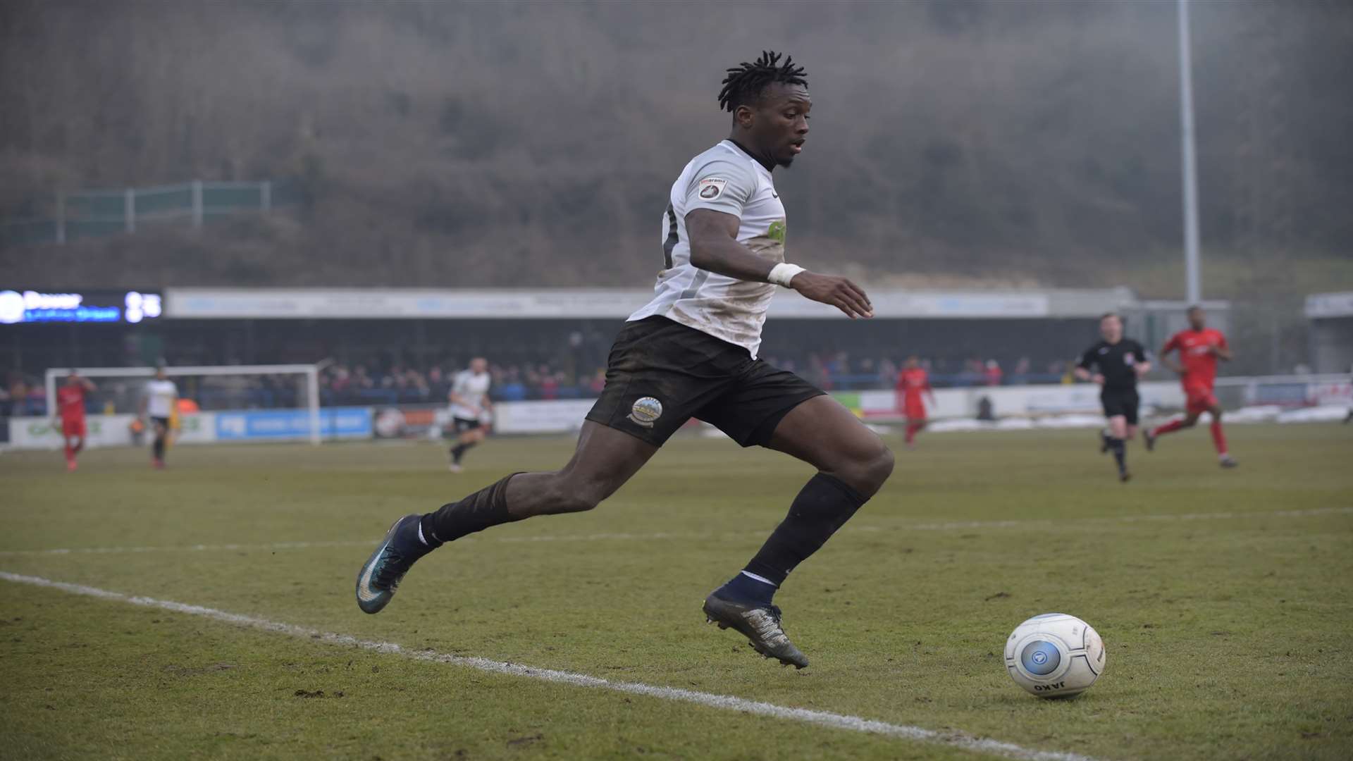 Adebayo Azeez on the attack for Dover against Leyton Orient. Picture: Tony Flashman