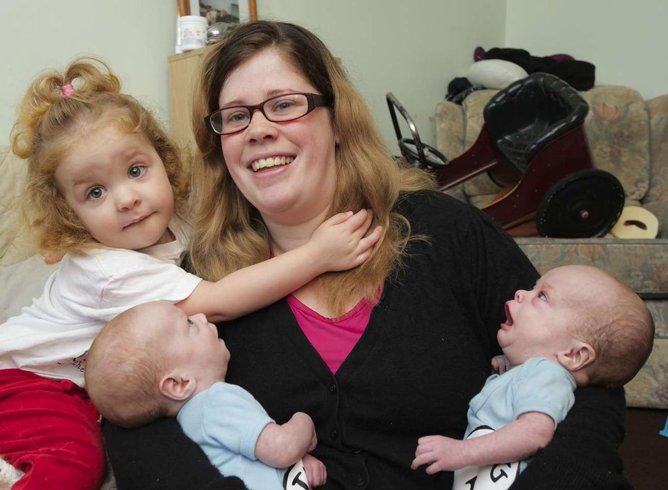 Cat Halliday, with twins Maxwell, right, and Alfie and daughter Tiffany