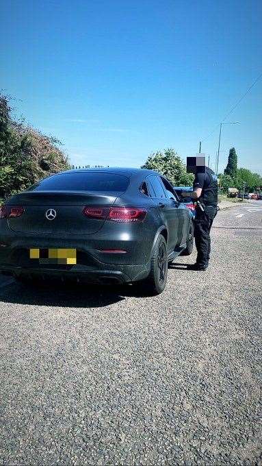 Officers talk to the driver. Picture: Kent Police RPU