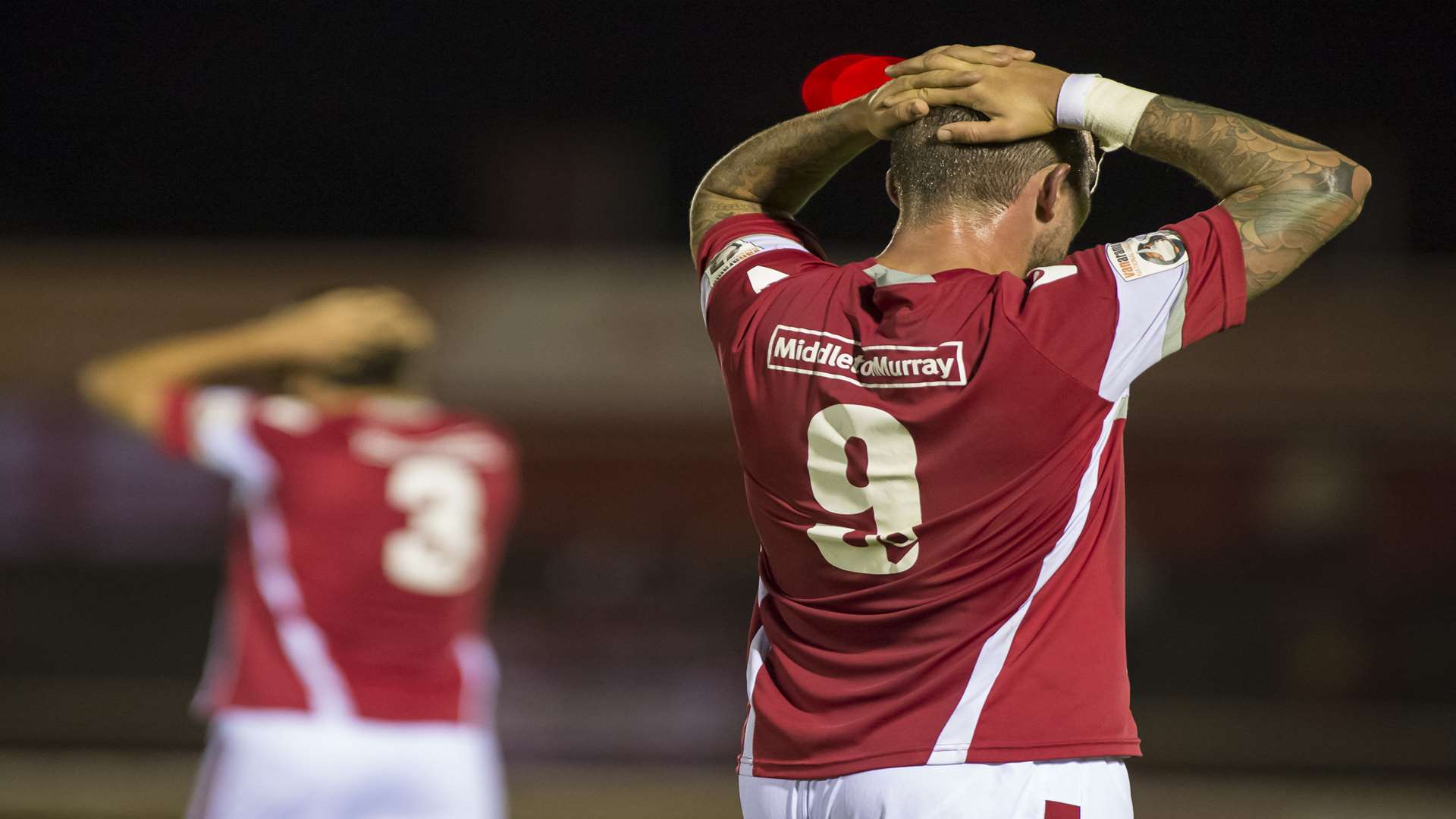 Heads in hands for Joe Howe and Danny Kedwell as Ebbsfleet exit the FA Cup Picture: Andy Payton