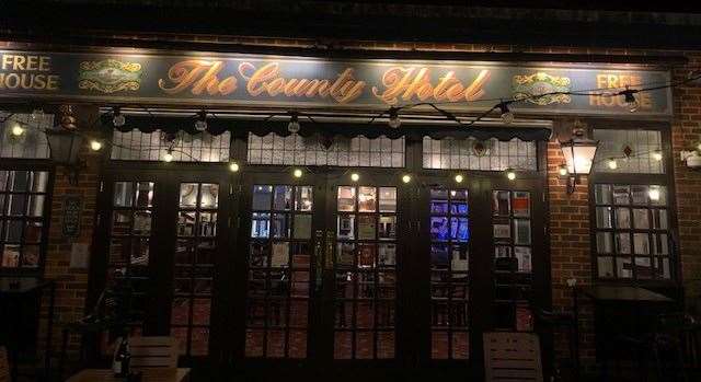 This ornate sign can be seen over the doors at the back of the pub