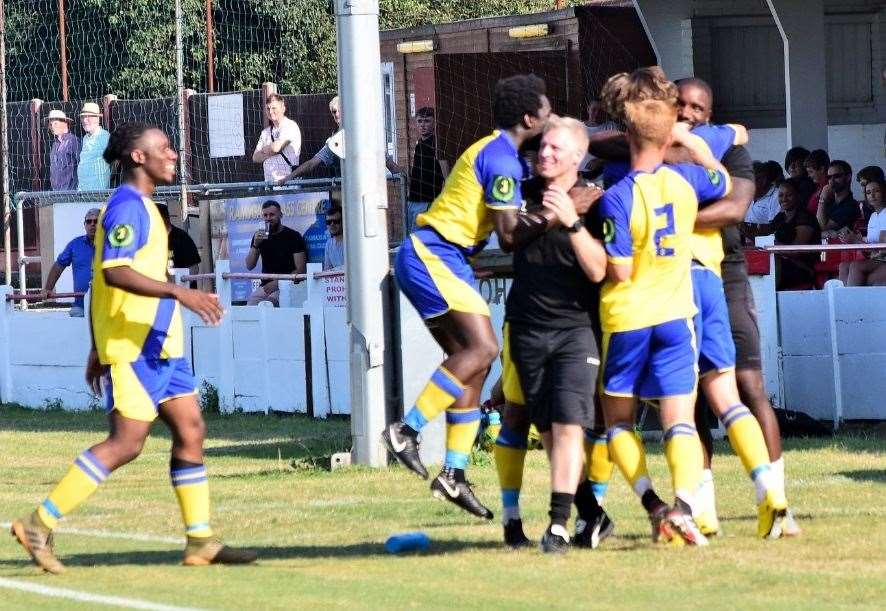 Sittingbourne players rush to the bench to celebrate Roman Campbell's winner at Ramsgate (15802021)