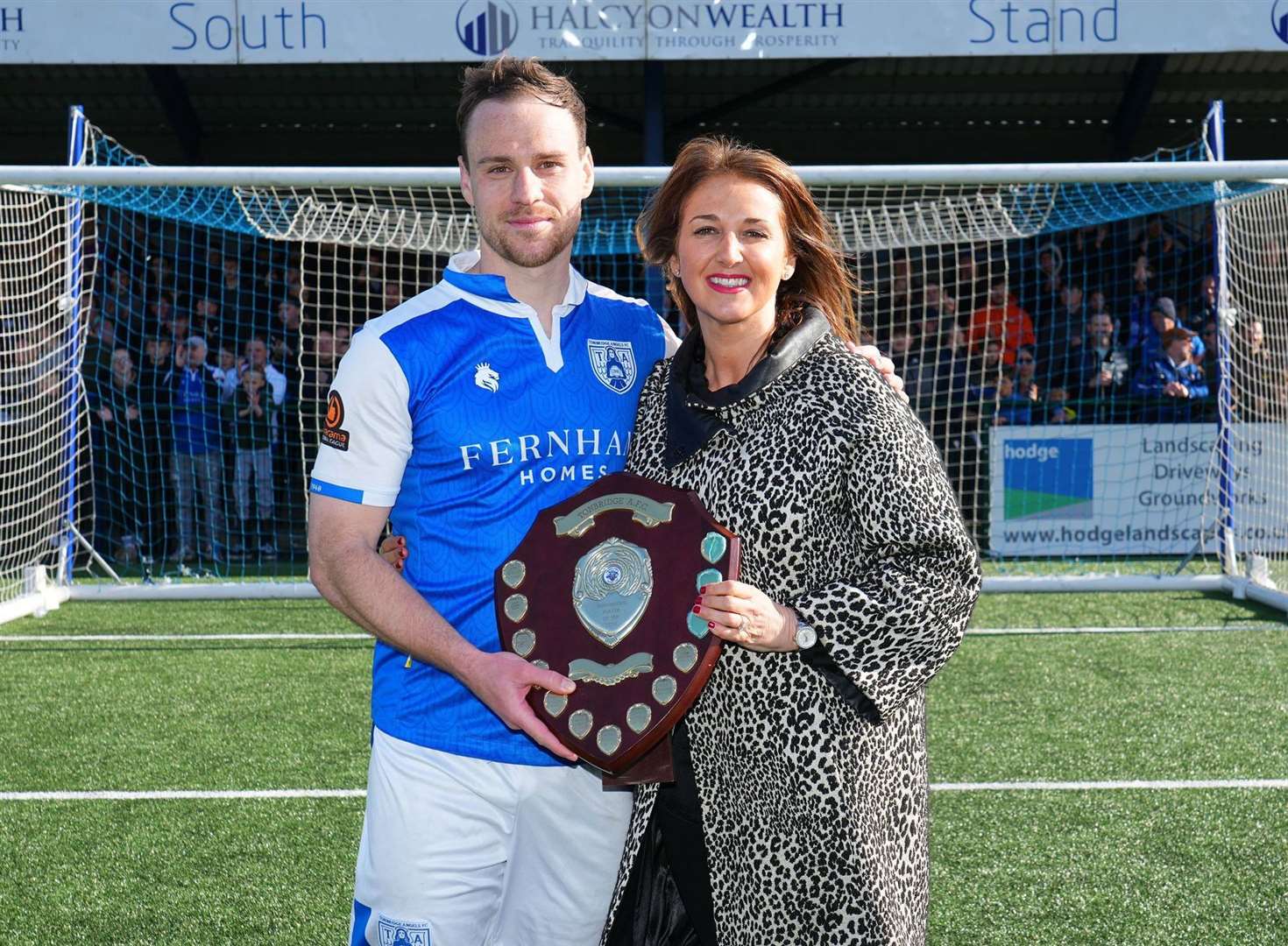 Tonbridge Angels player-of-the-year Jordan Higgs with chair Sophie Purves. Picture: David Couldridge