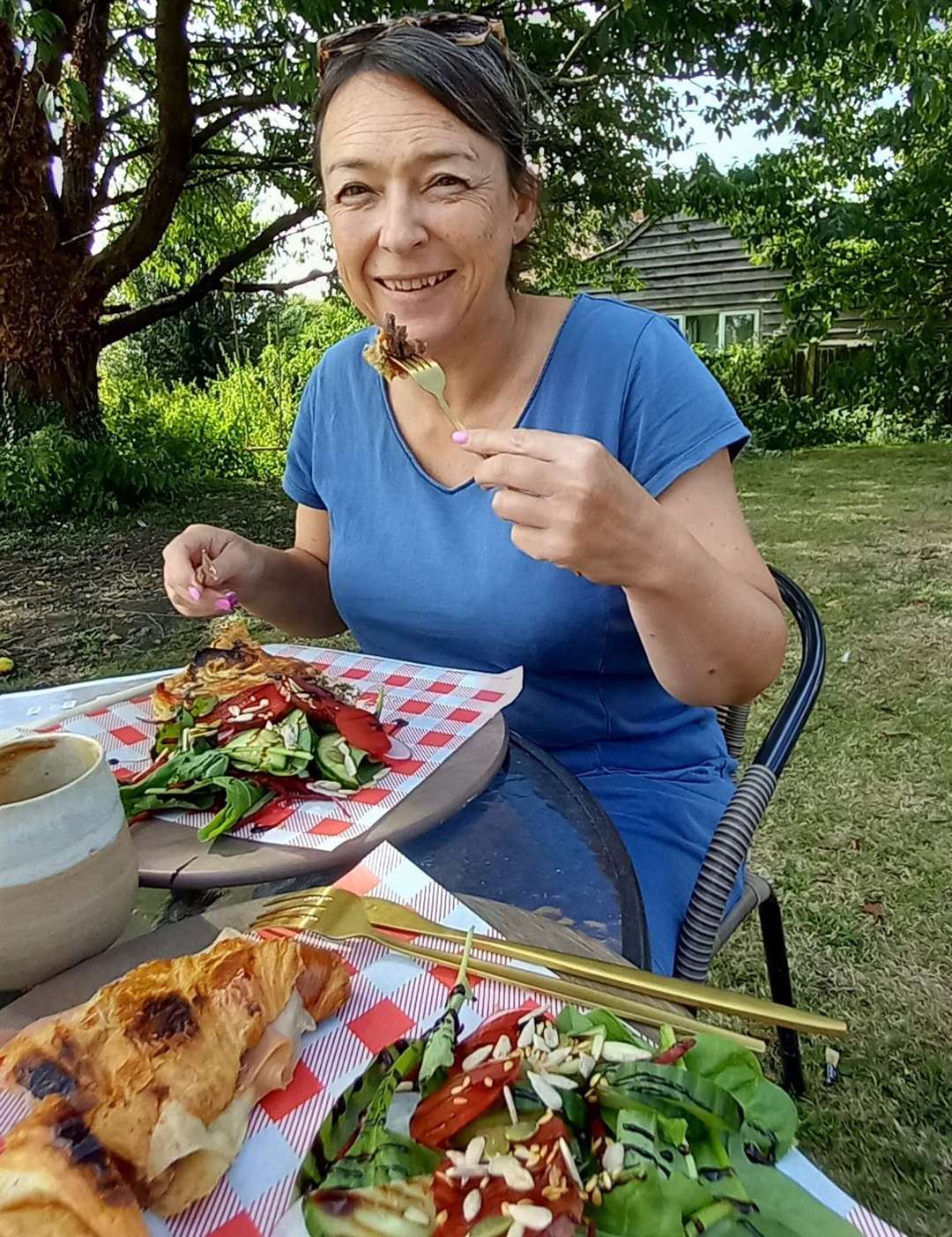 Nikki tucks into lunch