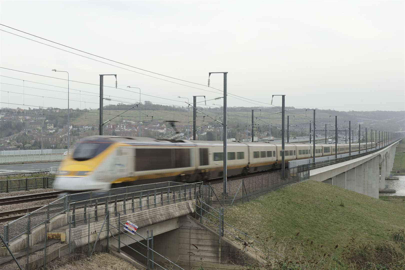 A Eurostar train crosses the Medway Valley bridge at Strood