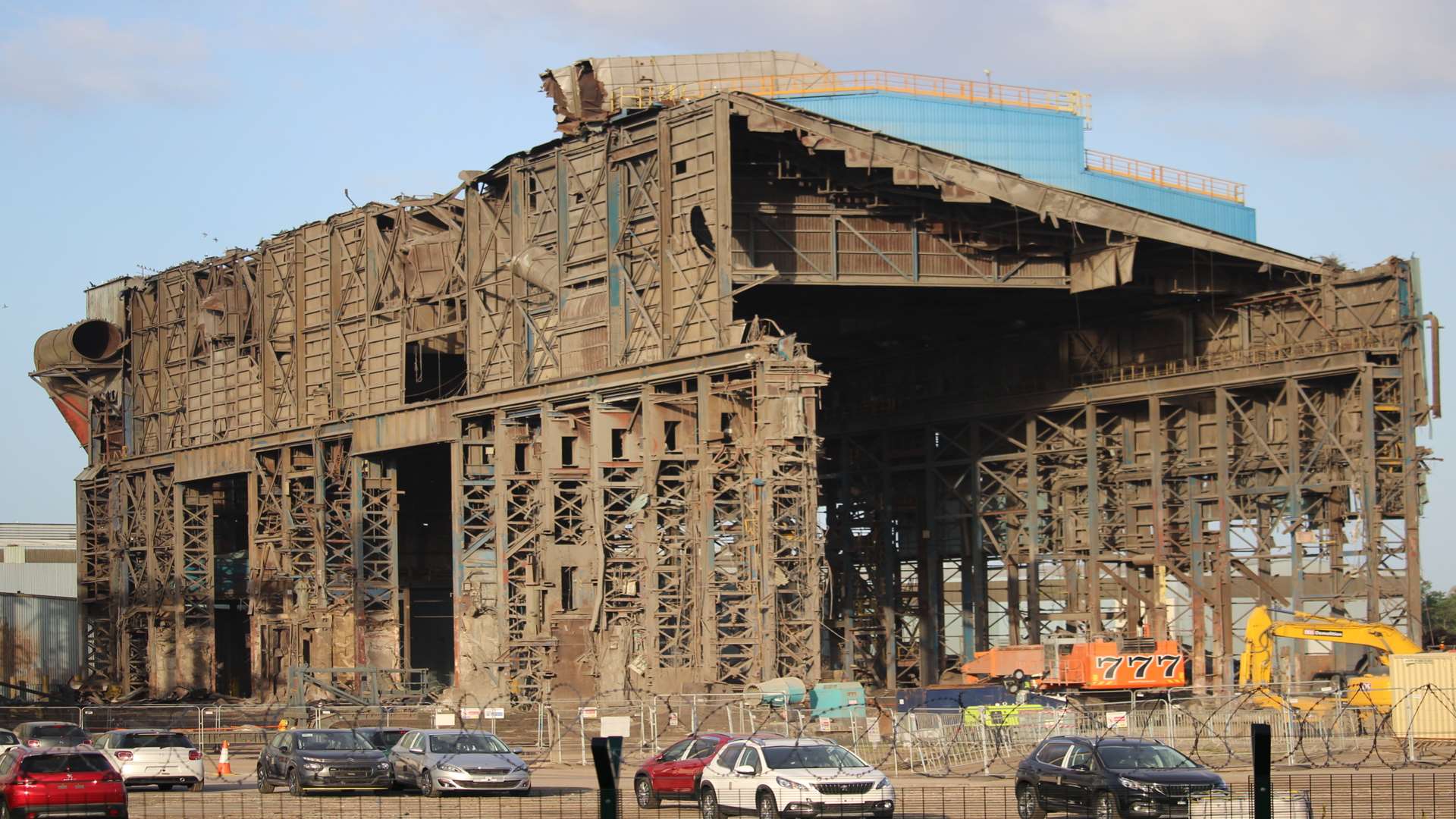 Watch it come down: only half of the main building is left standing