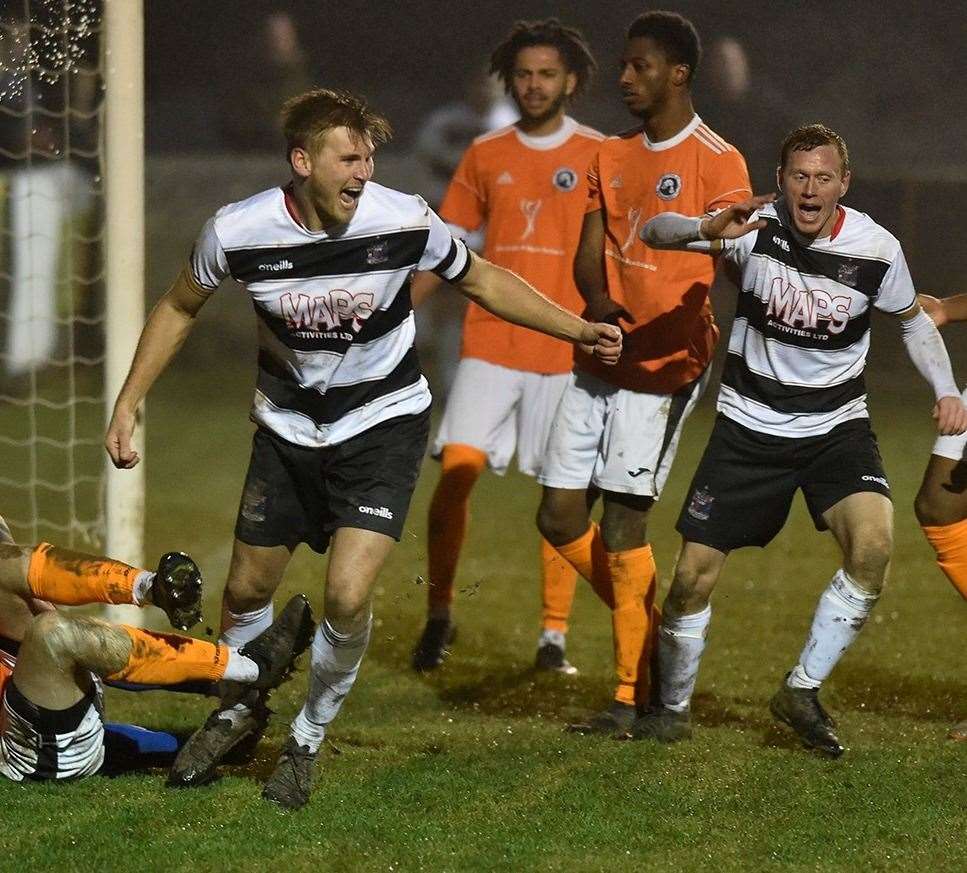 Deal captain Kane Smith wheels away after heading his side's third goal. Picture: Tony Flashman