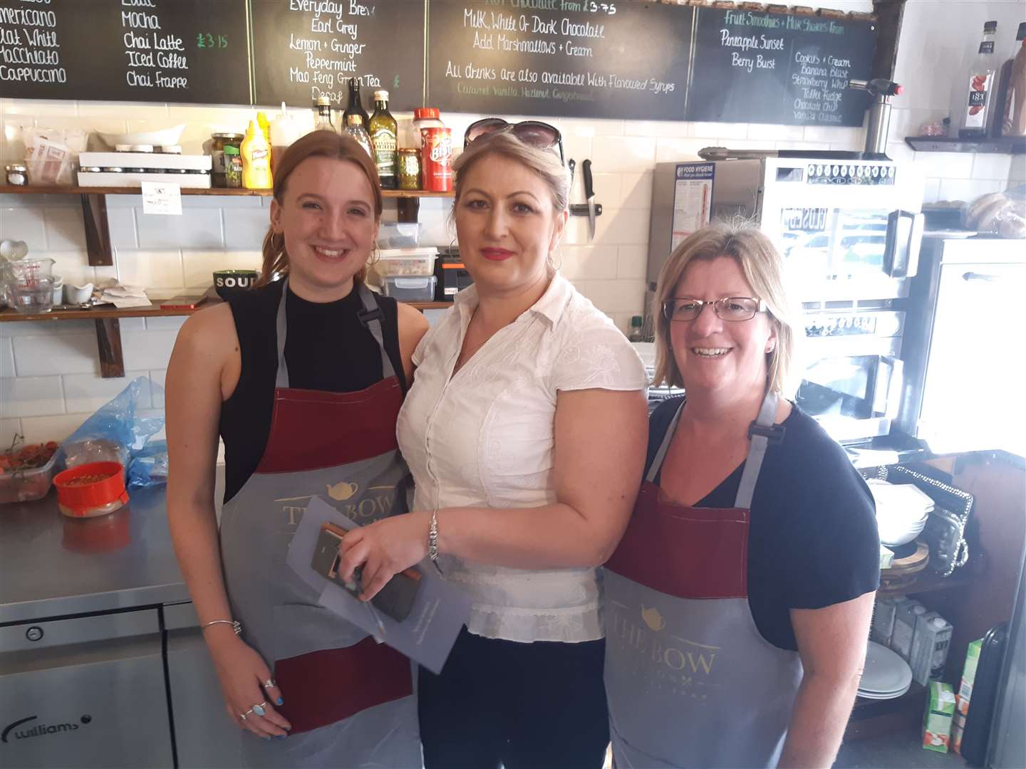 Ozlem Kanik with two of her staff: Scarlett Grindle (left) and Ingrid Goodsell