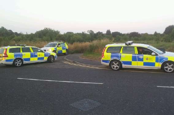 Police near Homebase car park after gun threat claims