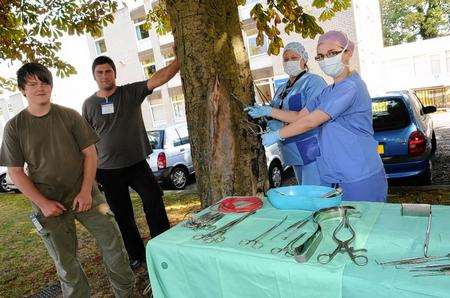 John Bussey with tree consultant Andrew Bussey, theatre sister Lesley Small and theatre support worker Fiona Kimpton