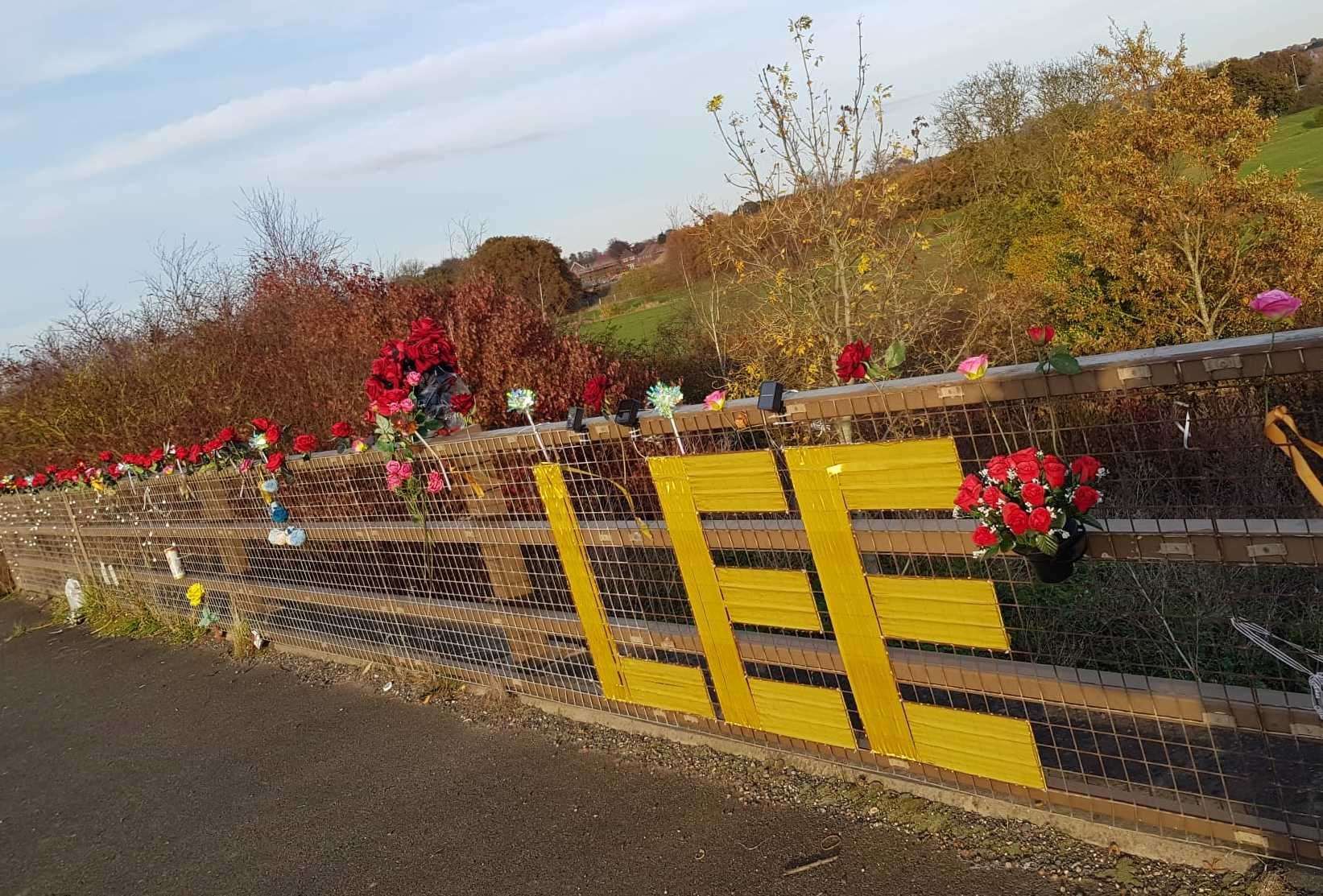 Floral tributes have been left on the Bullockstone Road bridge where Lee Harlow died