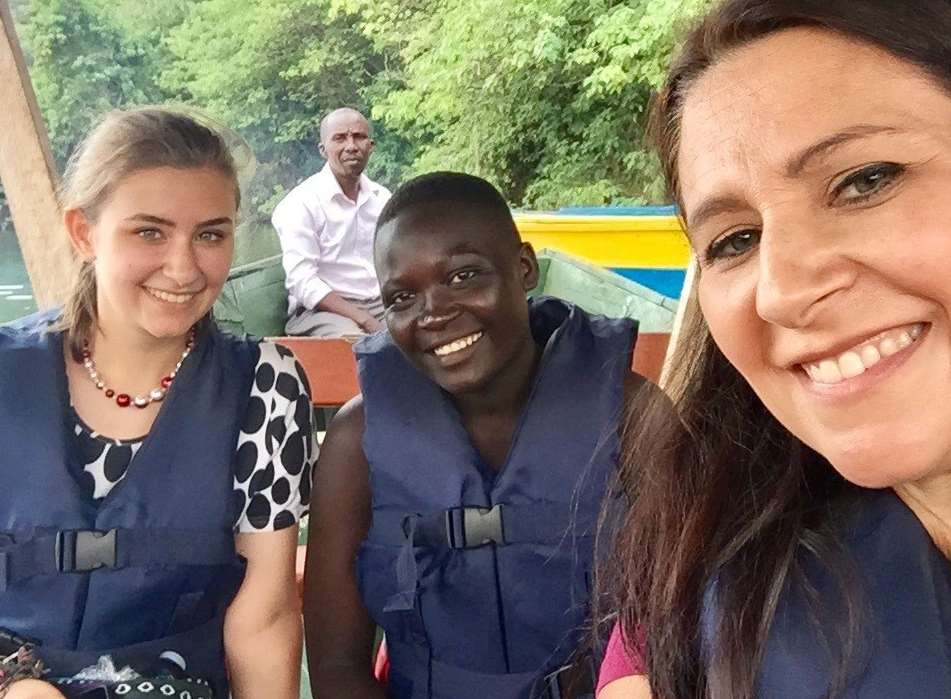 Tania Sullivan and her daughter Caitlin, 17, with Opisia Doreen in Uganda