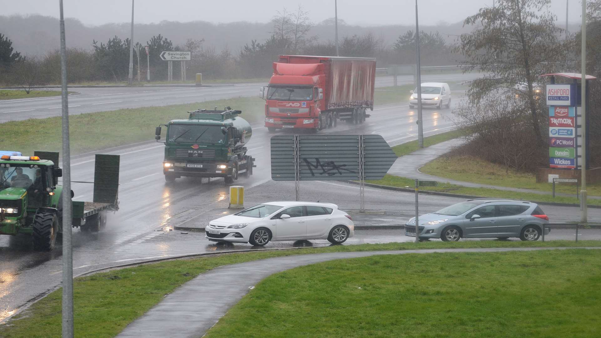 Vehicles turning out of Barrey Road onto the A2070 dual carriageway