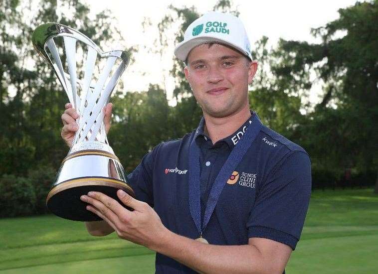 Sevenoaks' Kipp Popert gets his hands on the G4D Open trophy at Woburn. Picture: R&A